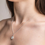 Model wears a Moonstone Pendent Necklace in Sterling Silver