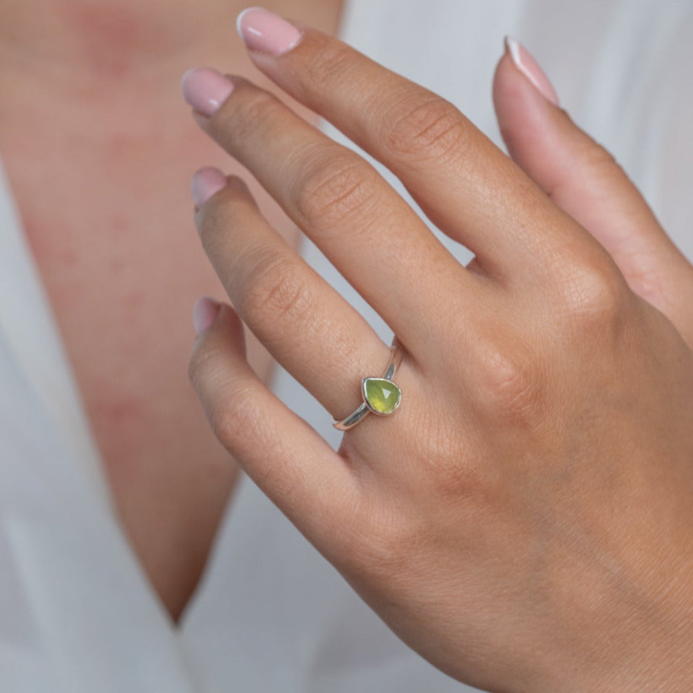 Peridot Gemstone Sterling Silver Pear shaped Ring worn on models hand