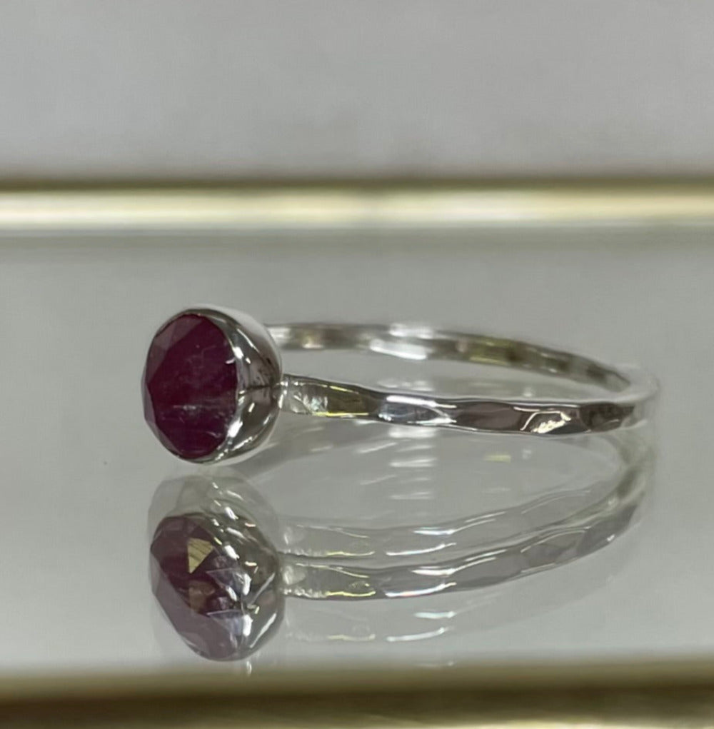Ruby Sterling Silver Hammered Textured Stacking Ring side view on a mirror background