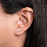 Handmade Sterling Silver Square shaped Hammered textured Earrings worn on models ear lobe