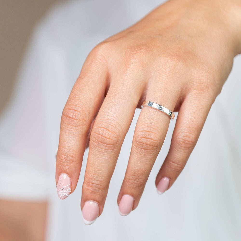 Sterling Silver Hammered textured Ring worn on models finger