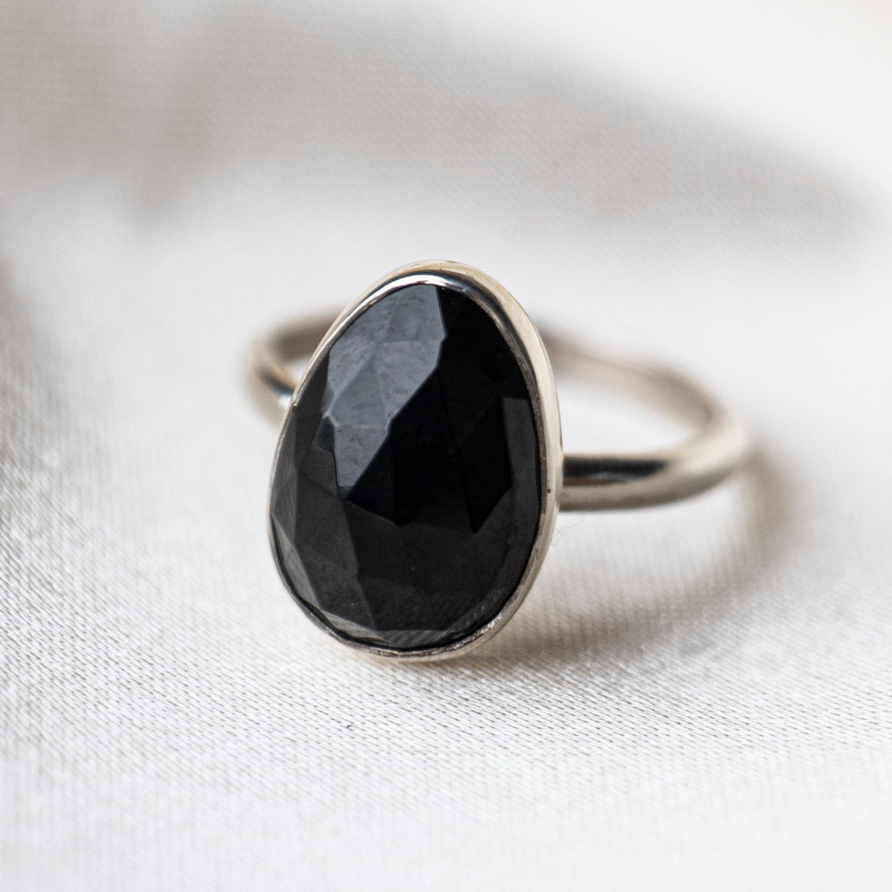 Black Spinel Statement Sterling Silver Ring worn on silk background