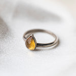 Citrine Gemstone Statememnt Sterling Silver Ring show on silk background