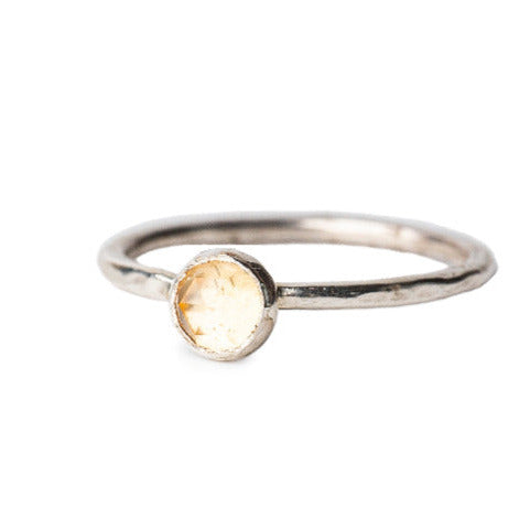 Citrine Rosecut Gemstone set on a hammered textured Sterling Silver Ring dispolayed on a white background