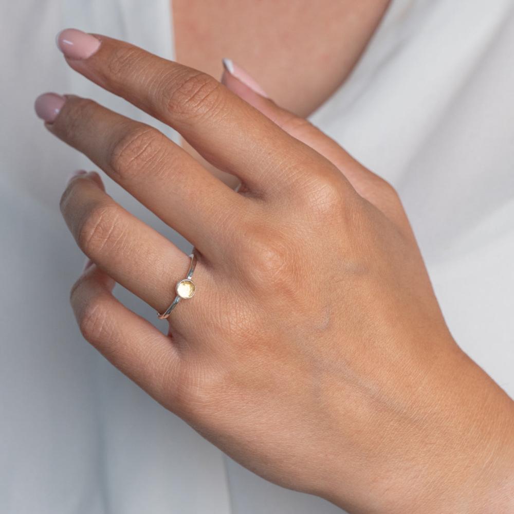 Model wears Citrine Hammered Sterling Silver Stacking Ring , with a white blouse and frenchtip manicured nails.