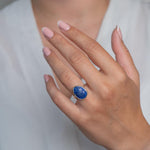 Sterling Silver Lapis Statement Ring worn on model's left hand.