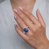 Sterling Silver Lapis Statement Ring worn on model's left hand.