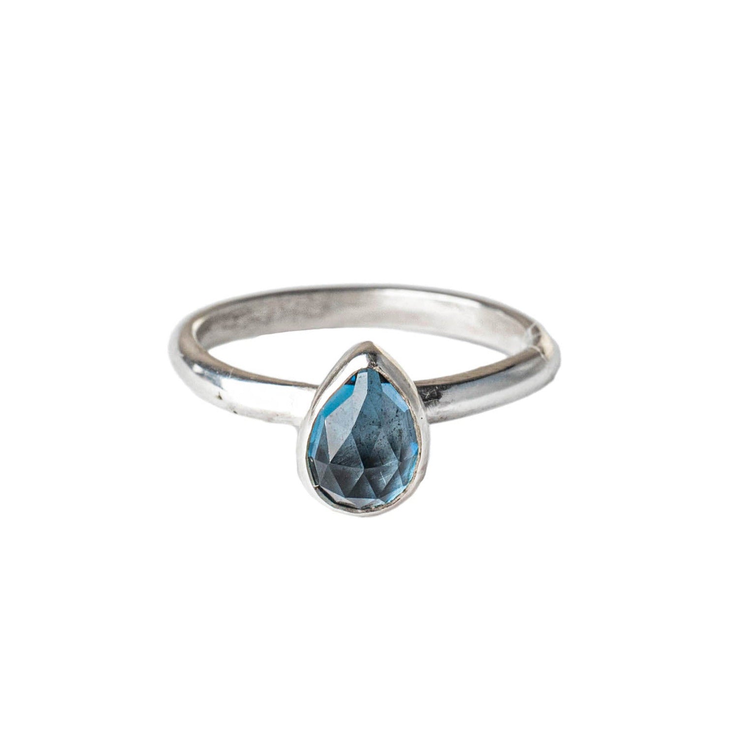 London Blue Topaz Gemstone Prear Sterling Silver Ring on white background 