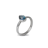 London Blue Topaz Gemstone Prear Sterling Silver Ring on white background 