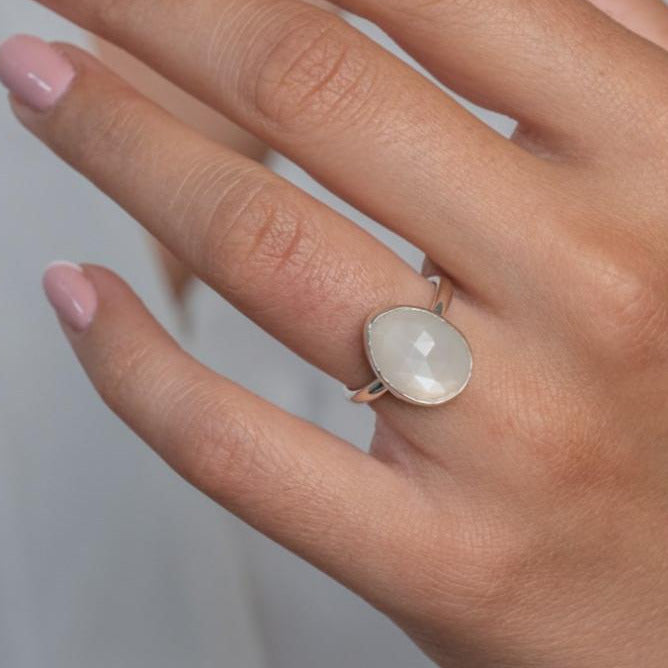 Sterling Silver Moonstone Statement Ring worn on model's left hand.