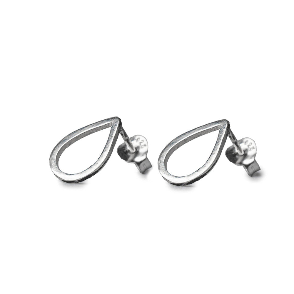 Pear Sterling Silver Earrings on white Background 