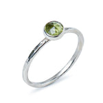 Peridot Sterling Silver Hammered Stacking Ring side view on a white background