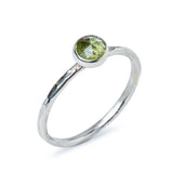 Peridot Sterling Silver Hammered Stacking Ring side view on a white background