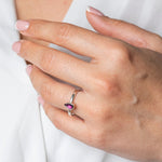 Rhodolite Garnet Gemstone Pear shaped Sterloing Silver Ring worn on models hand 