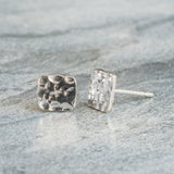 Square Hammered Sterling Silver Earrings on Grey Marble background 