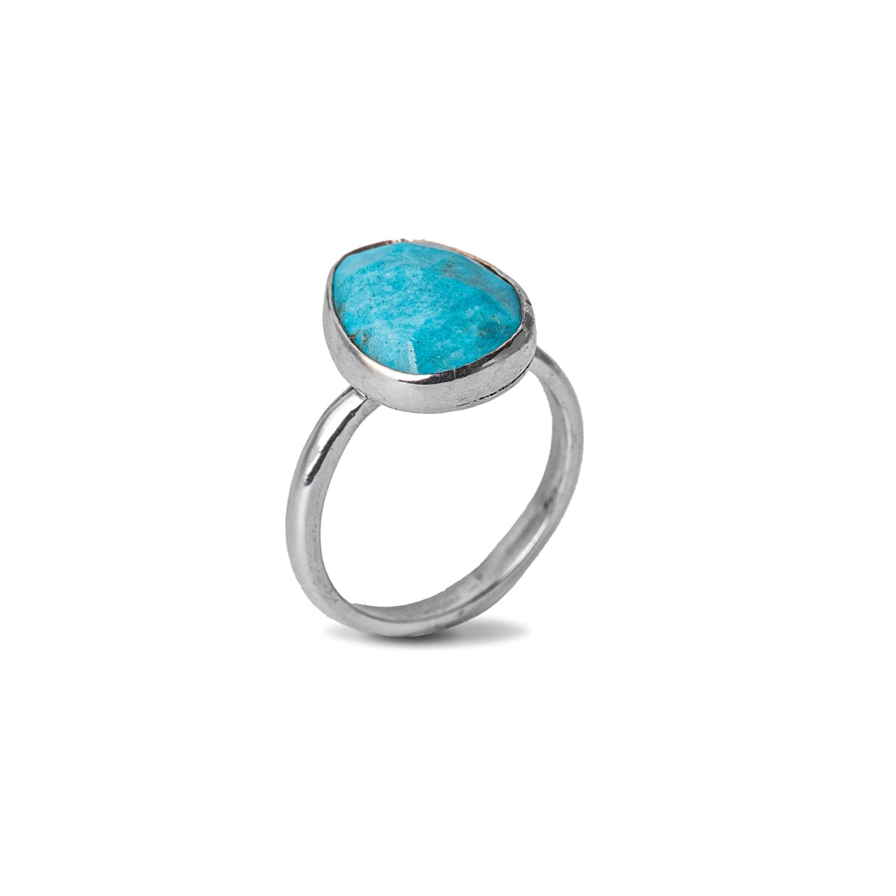 Tourquise Gemstone Sterling Silver Ring on White Background at a angled tilt 