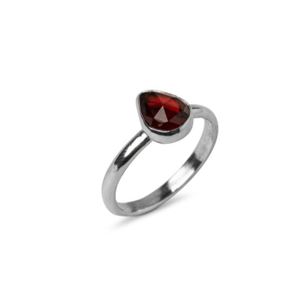 Handmade Sterling Silver Garnet Pear Gemstone Ring on a white background, side profiler.