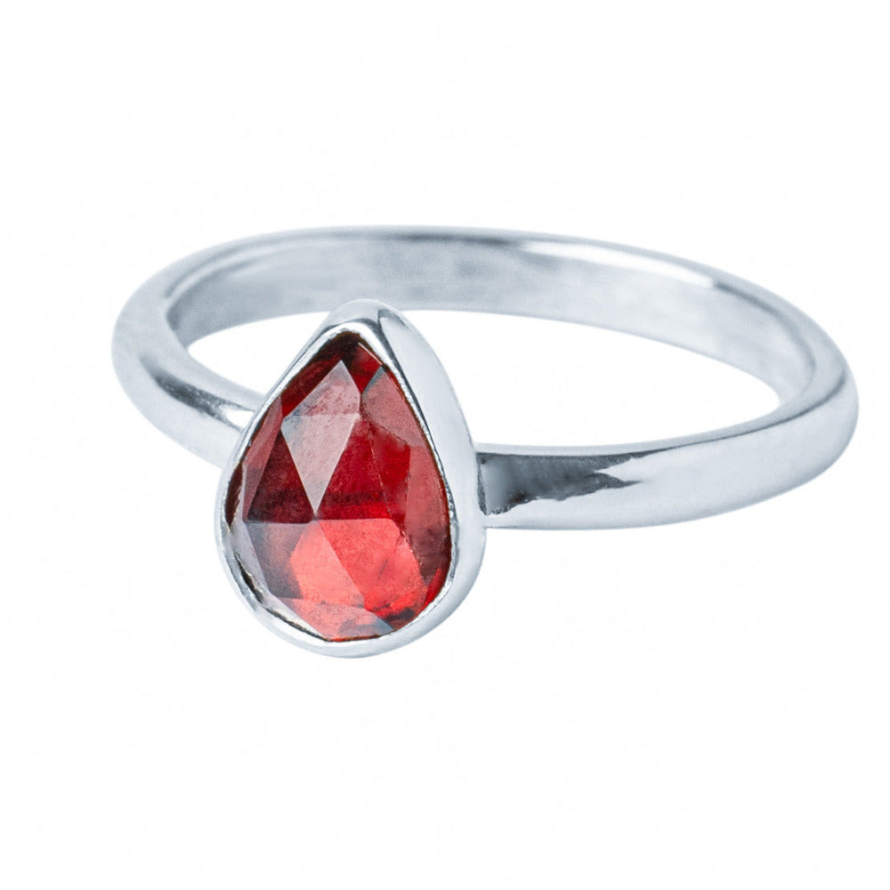 Handmade Sterling Silver Garnet Pear Gemstone Ring on a white background.