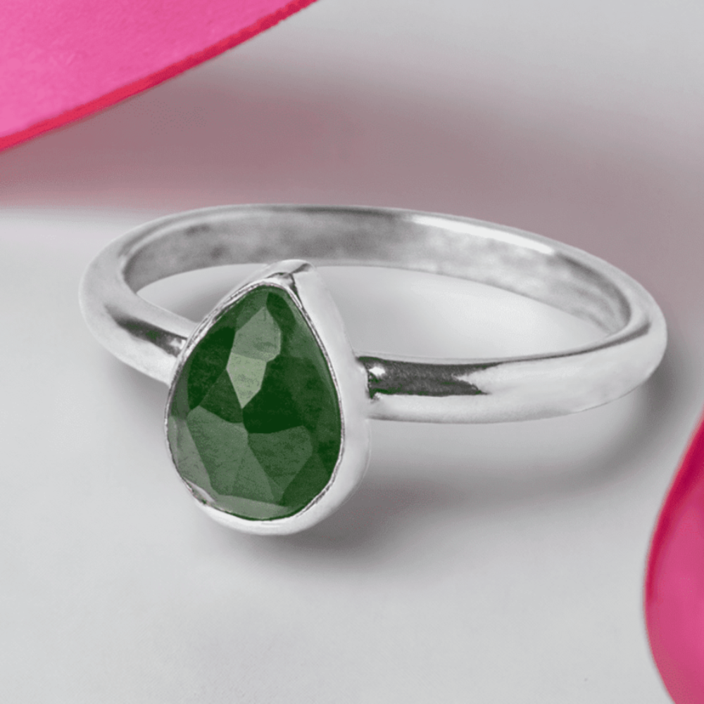 Handmade Sterling Silver Jade Pear Gemstone Ring on a white background with pink ribbon