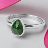 Handmade Sterling Silver Jade Pear Gemstone Ring on a white background with pink ribbon