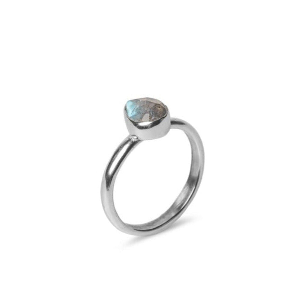 Handmade Labradorite Gemstone Ring in a Pear shape set in Sterling Silver, side profile view on a White background.