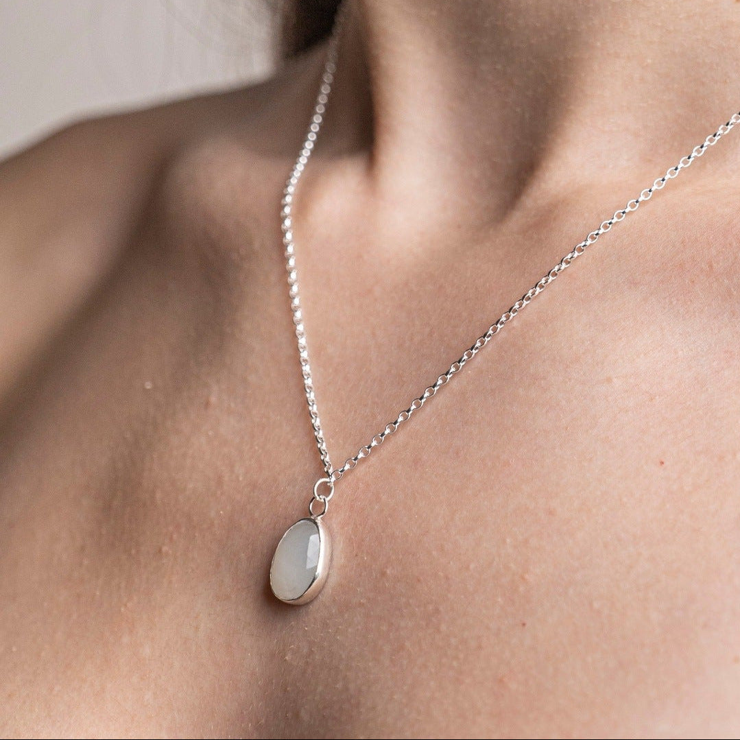Model wears a Moonstone Pendent Necklace in Sterling Silver 