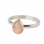 Handmade Sterling Silver Peach Moonstone Pear Gemstone Ring on a white background.