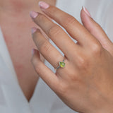 Peridot Gemstone Sterling Silver Pear shaped Ring worn on models hand 