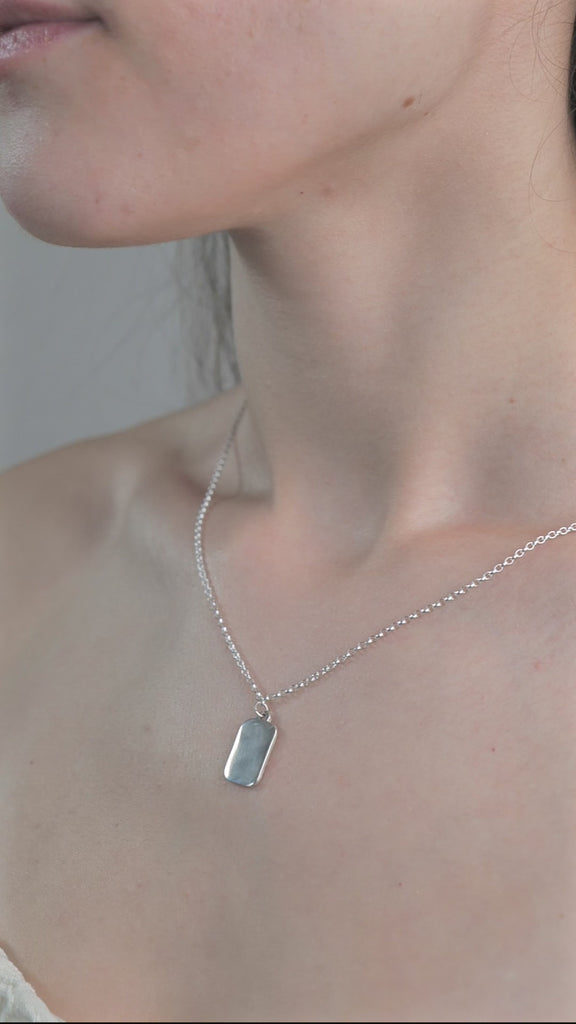 Sterling Silver Tag Pendent Necklace worn by model.