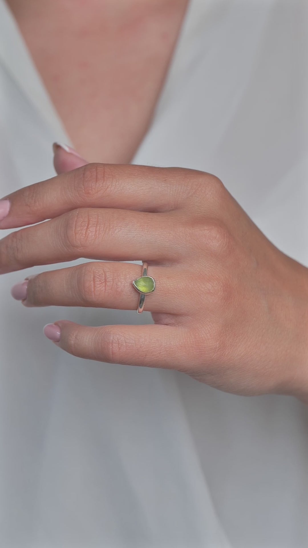 Peridot Gemstone Sterling Silver Pear shaped Ring worn on models hand movie