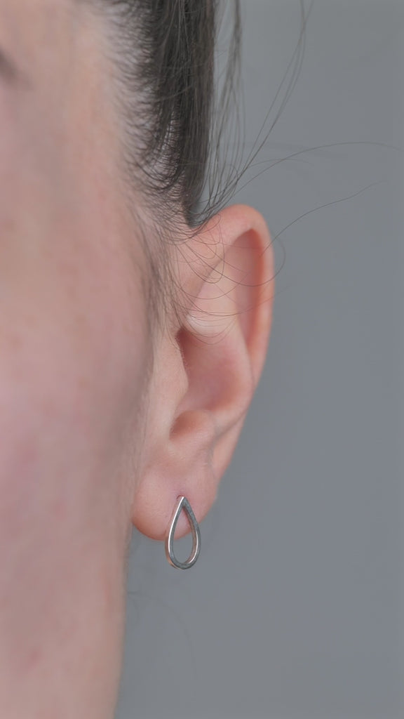 Sterling Silver Earrings Pear shaped, worn in models ear 