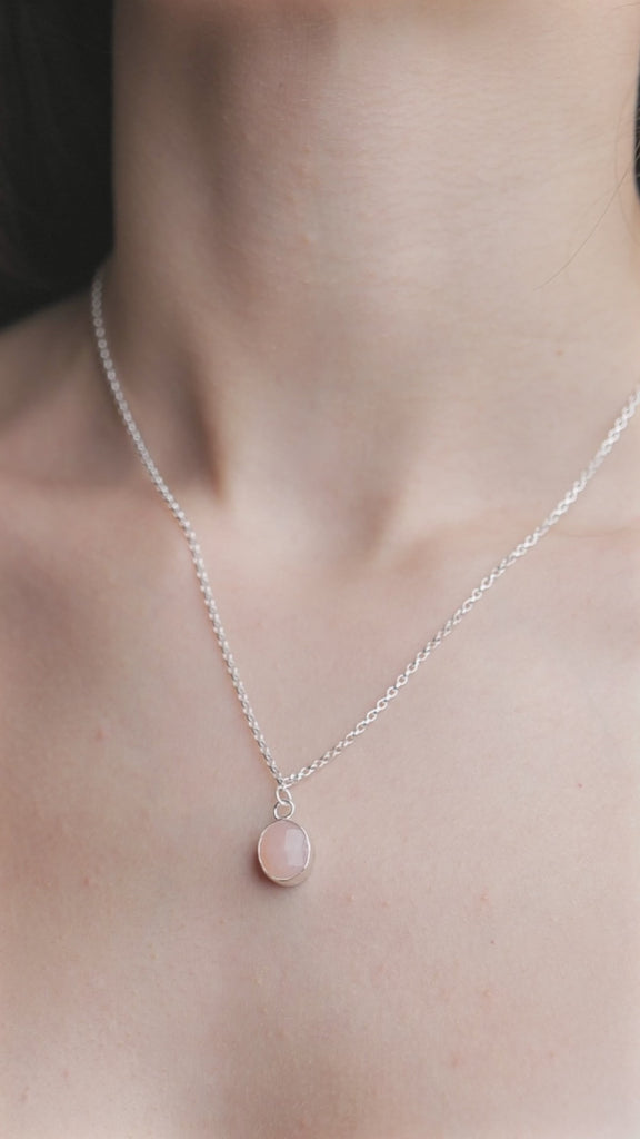 Pink Opal Gemstone Pendent worn on a model, video