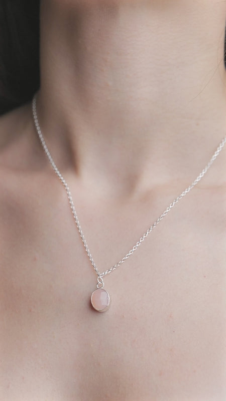Pink Opal Gemstone Pendent worn on a model, video