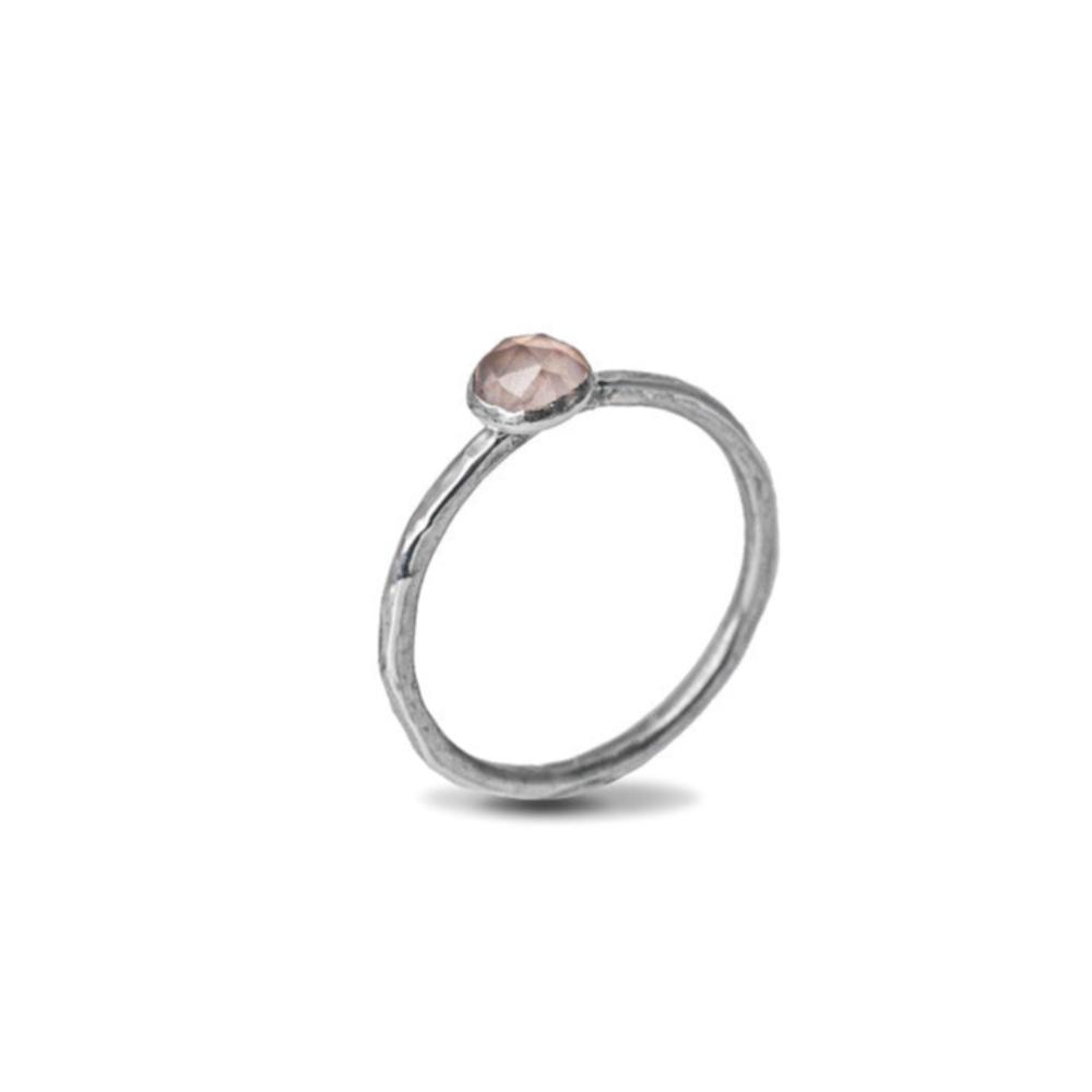 Rose Quartz Sterling Silver Hammered Stacking Ring side view on a white background. 